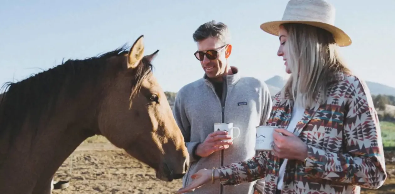 Couple with horse at Brasada Ranch